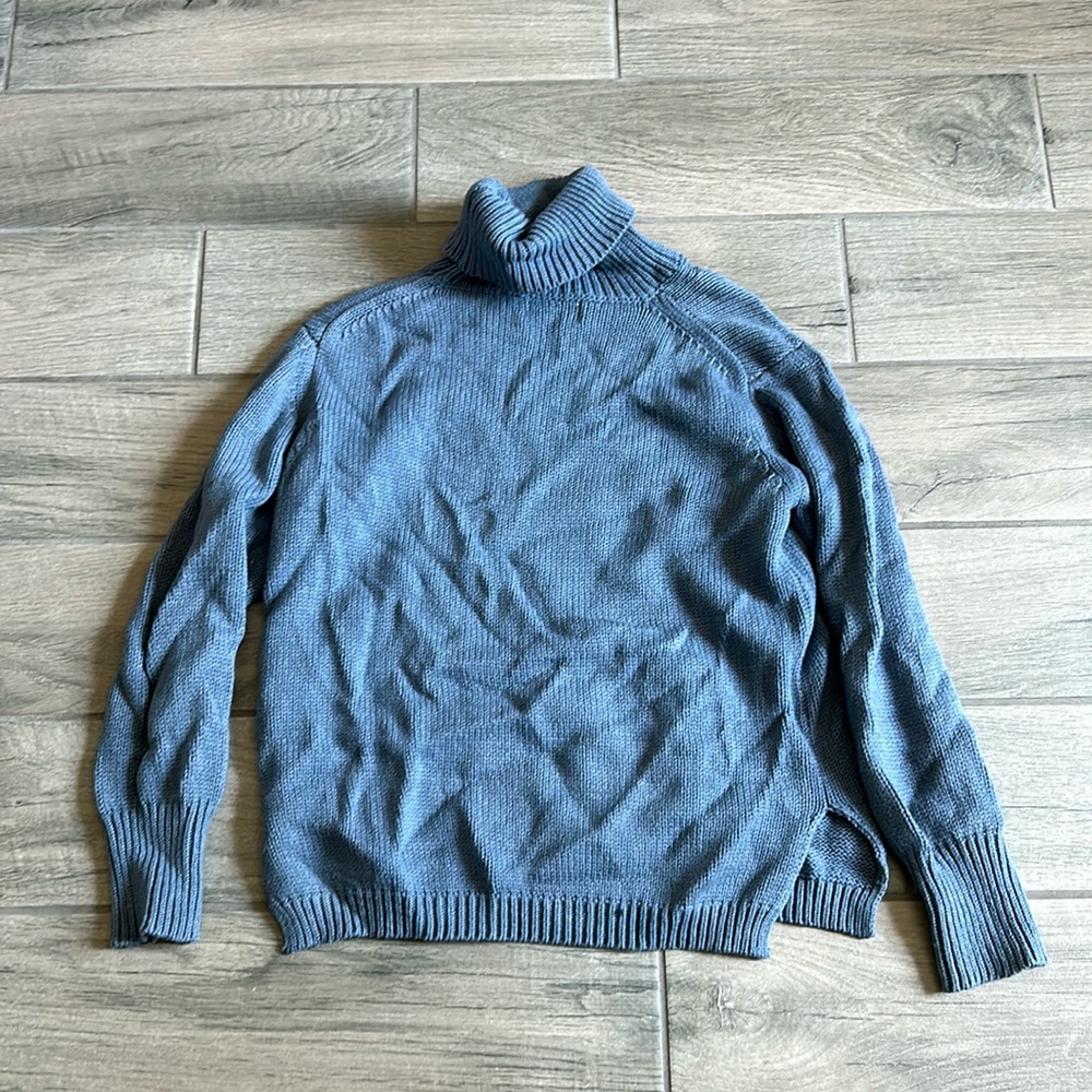 Kittenish blue turtleneck sweater